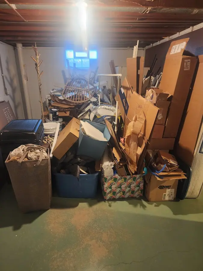 Roll-off dumpster container at job site for 15 Yard Dumpster Rental in Dodgeville